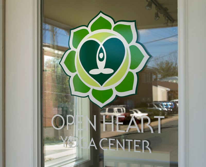 Yoga studio logo design on entry door